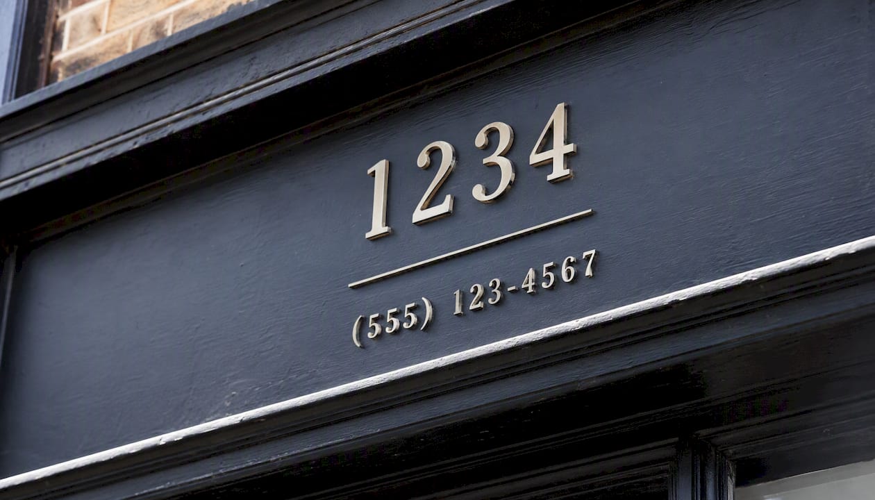 Business storefront name, address, and phone details