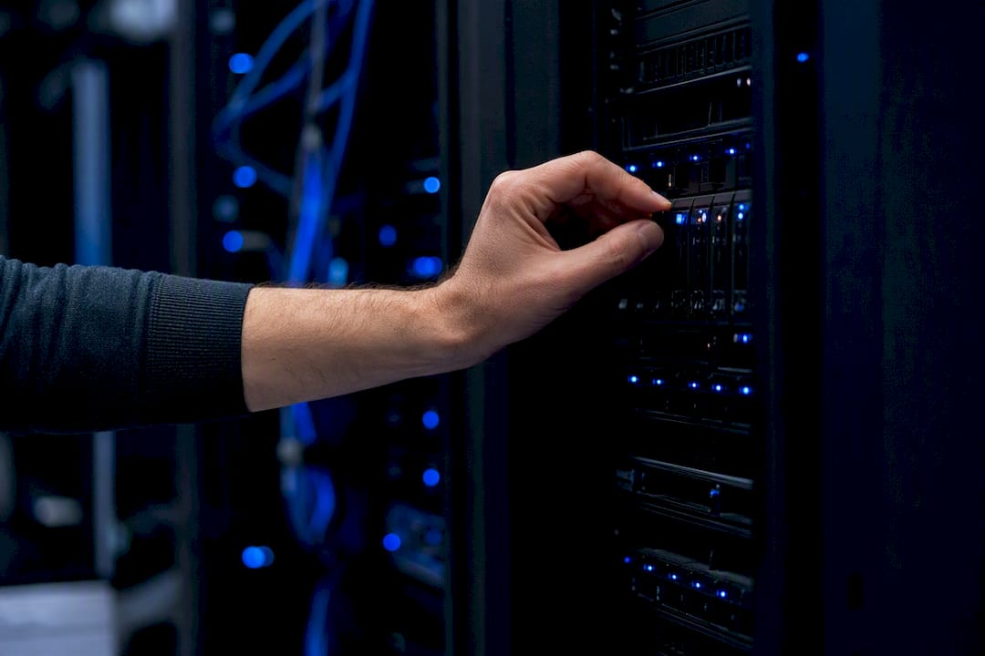 Hand toggling switches on server rack